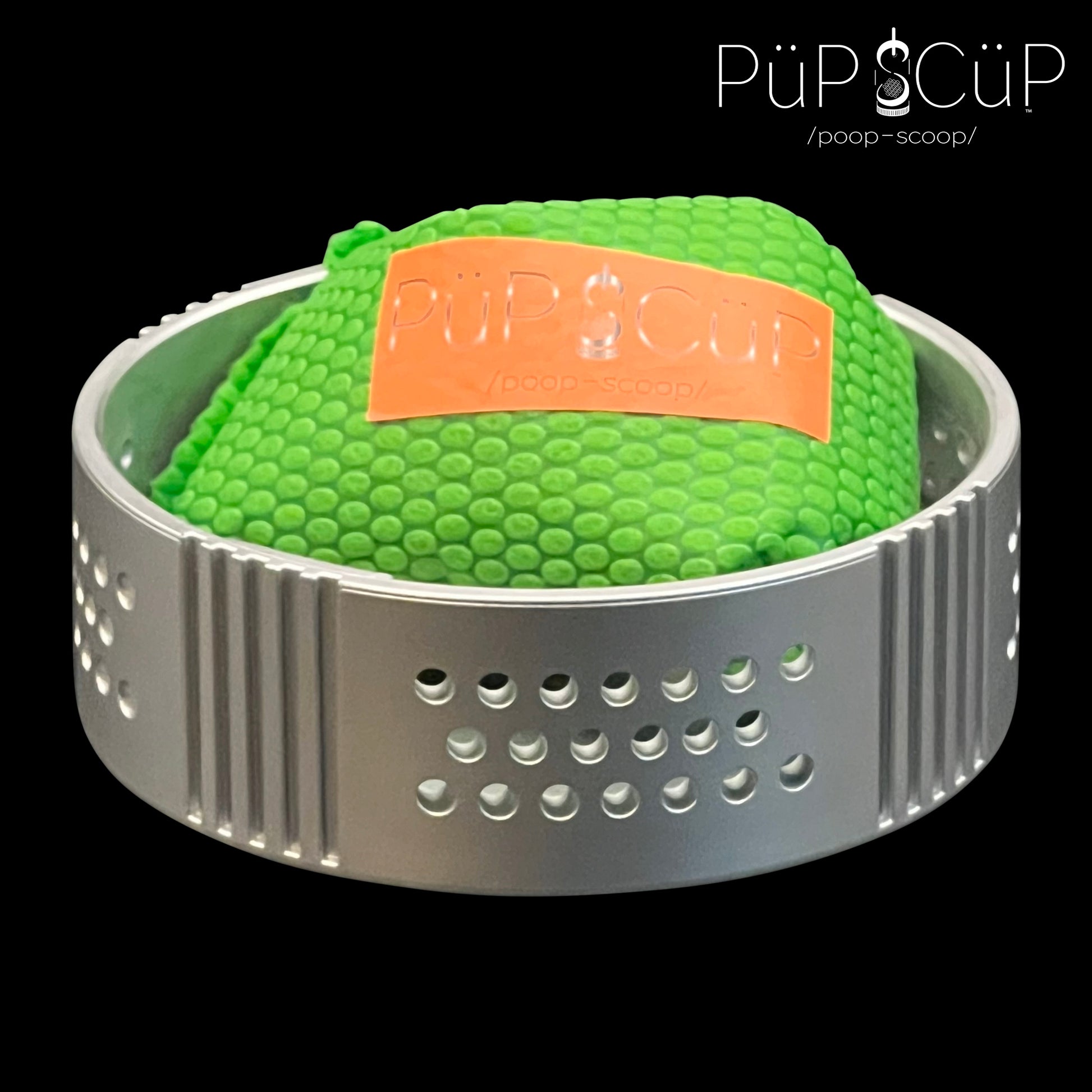 The bottom of the plastic PÜP SCÜP™ pet litter scoop containment system, showcasing the locking plastic vented cavity designed to deter mis-handling. The open compartment houses a replaceable NōSmell™ premium activated charcoal odor control bag, available in a 3-pack box.
