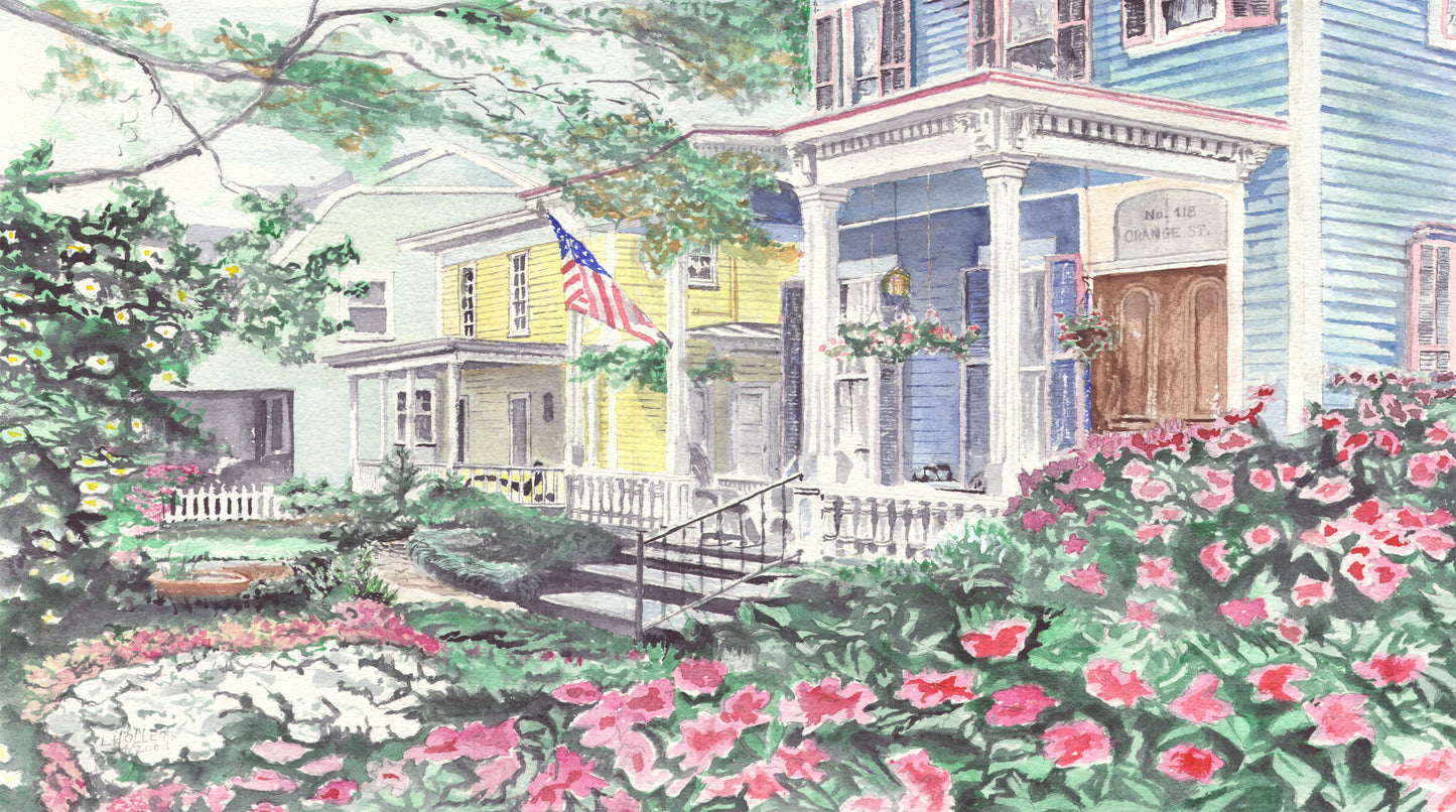 Colorful watercolor print of historic Wilmington NC SCÜPskin™ Deco-Sleeve on patented PÜP SCÜP™  litter scoop caddy.